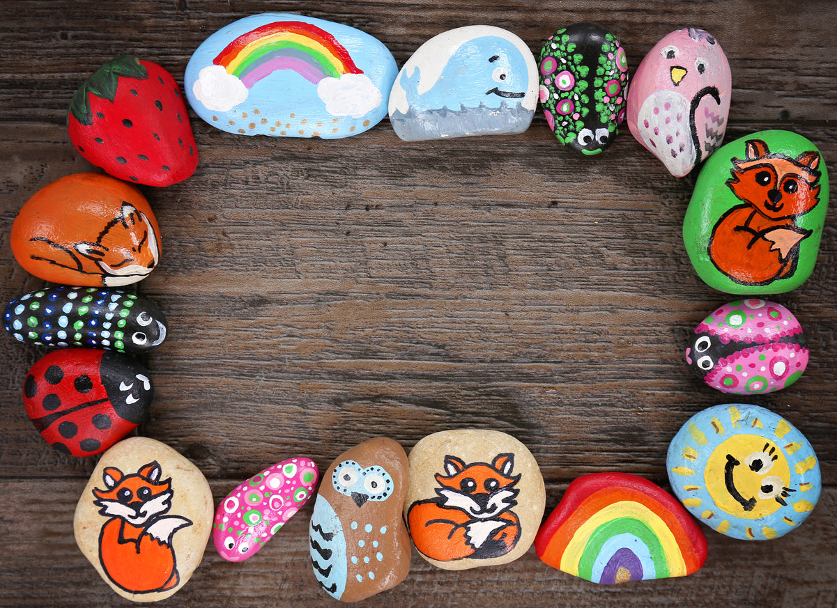 brightly colored painted rocks in a circle