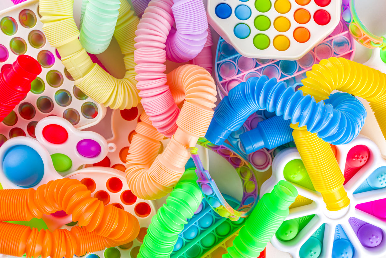 pile of colorful fidget toys