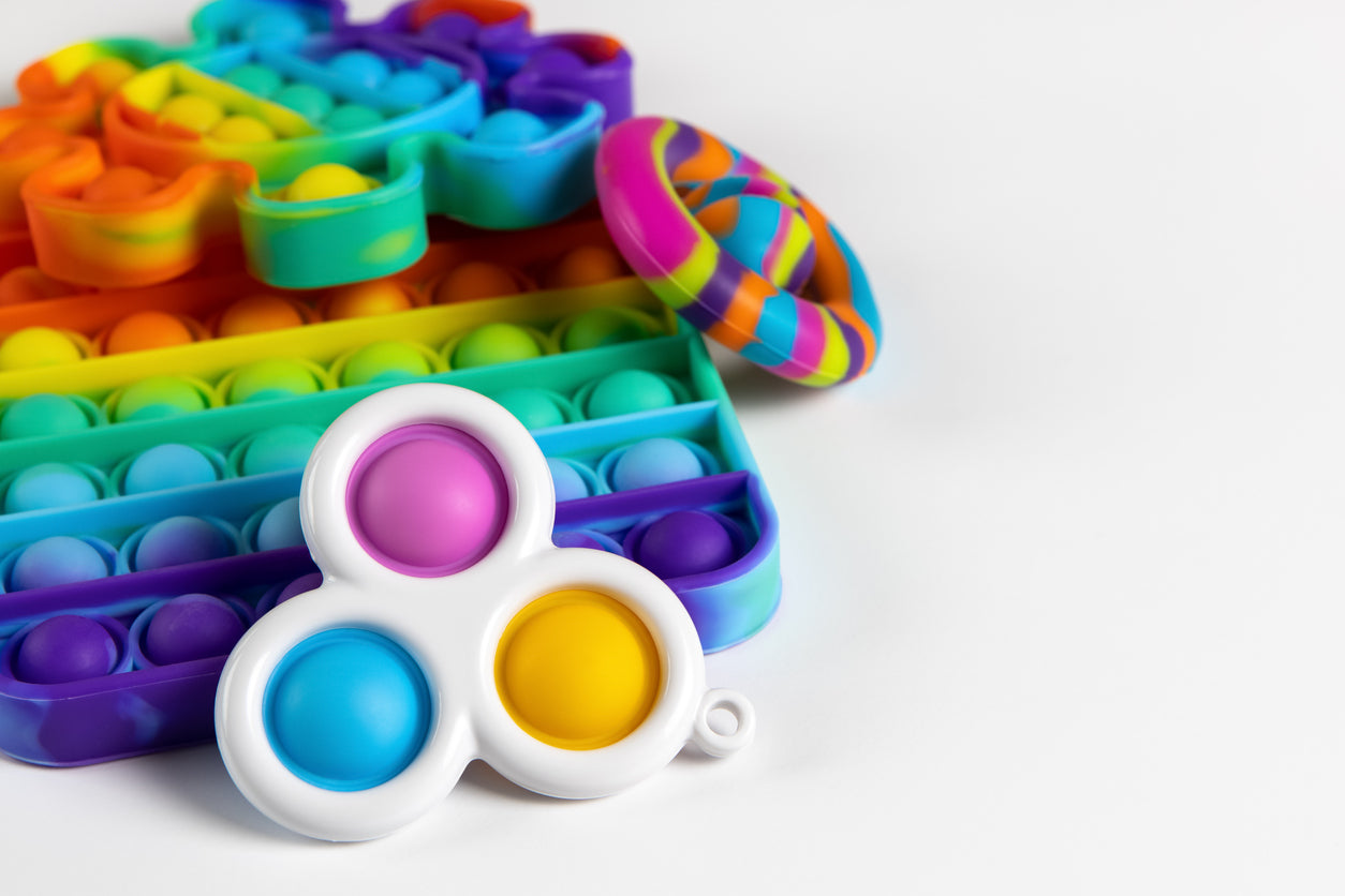 colorful pop its and fidget toys