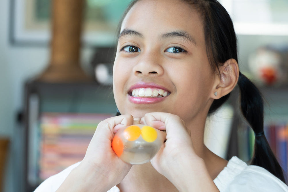 Student Using Fidget Toy Best Sensory Toys & Silent Classroom Fidgets for Elementary Students