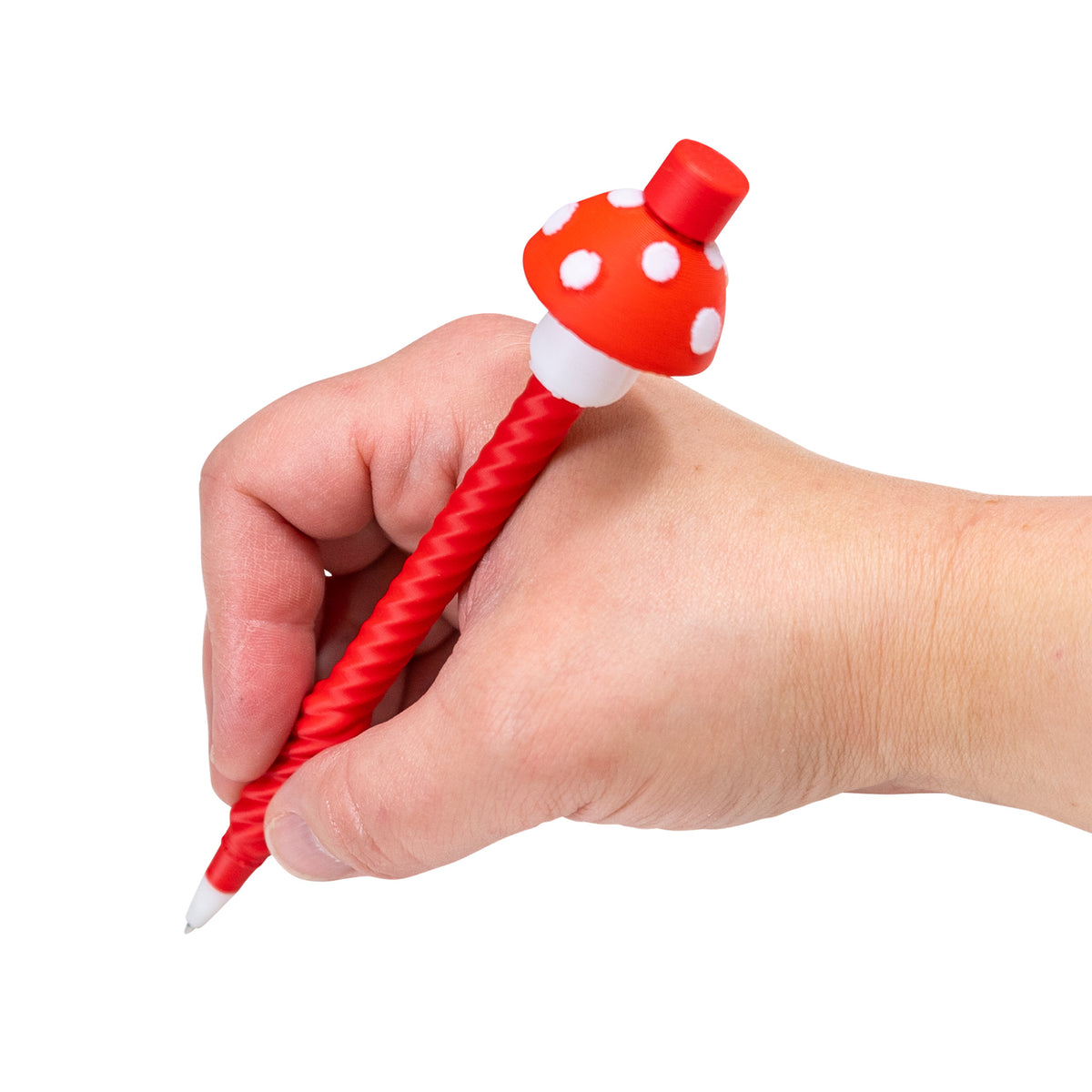 Hand writing with the red mushroom Twirly Swirly Fidget Pen.