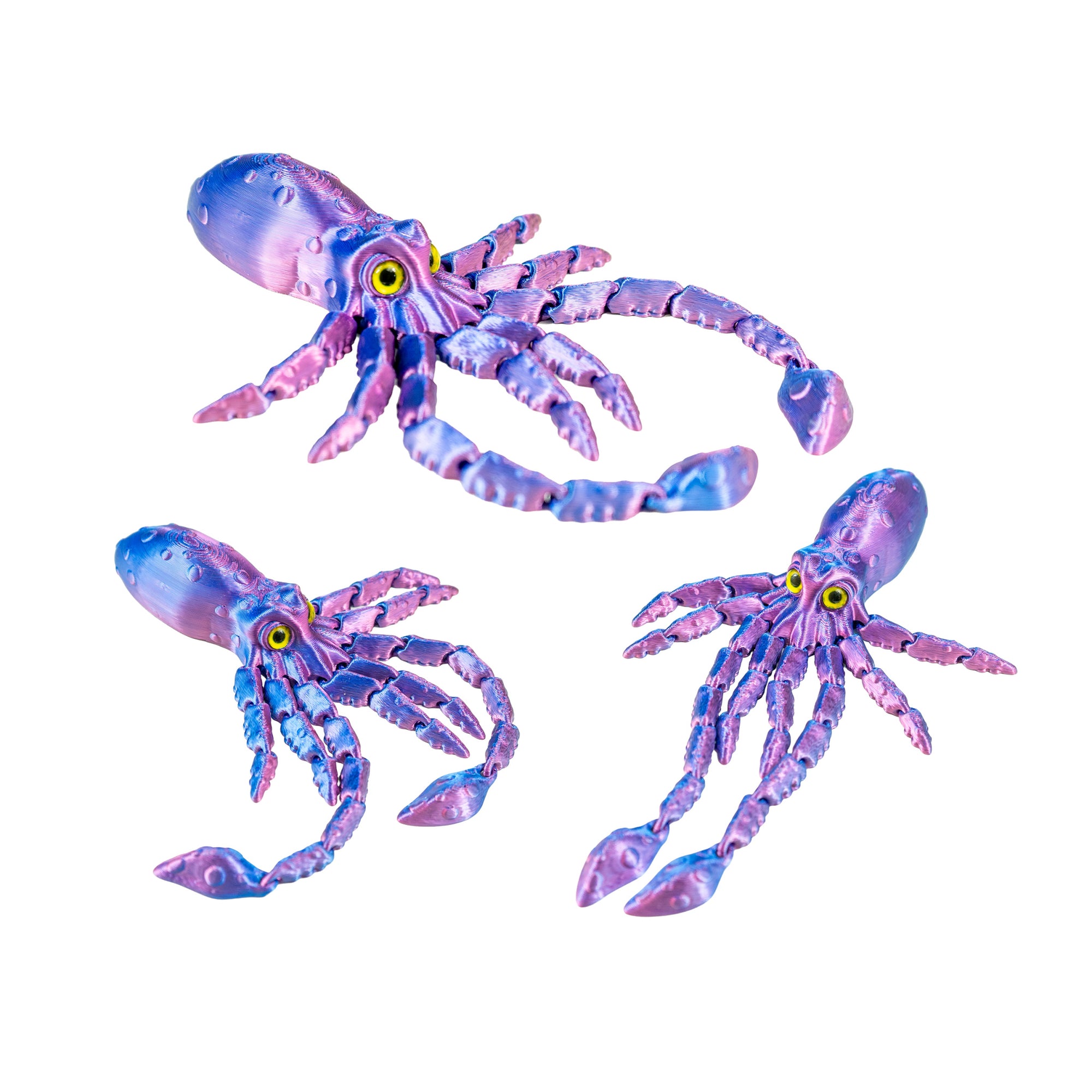 Three purple and blue 3D-printed squid fidget toys arranged in different poses on a plain white background.