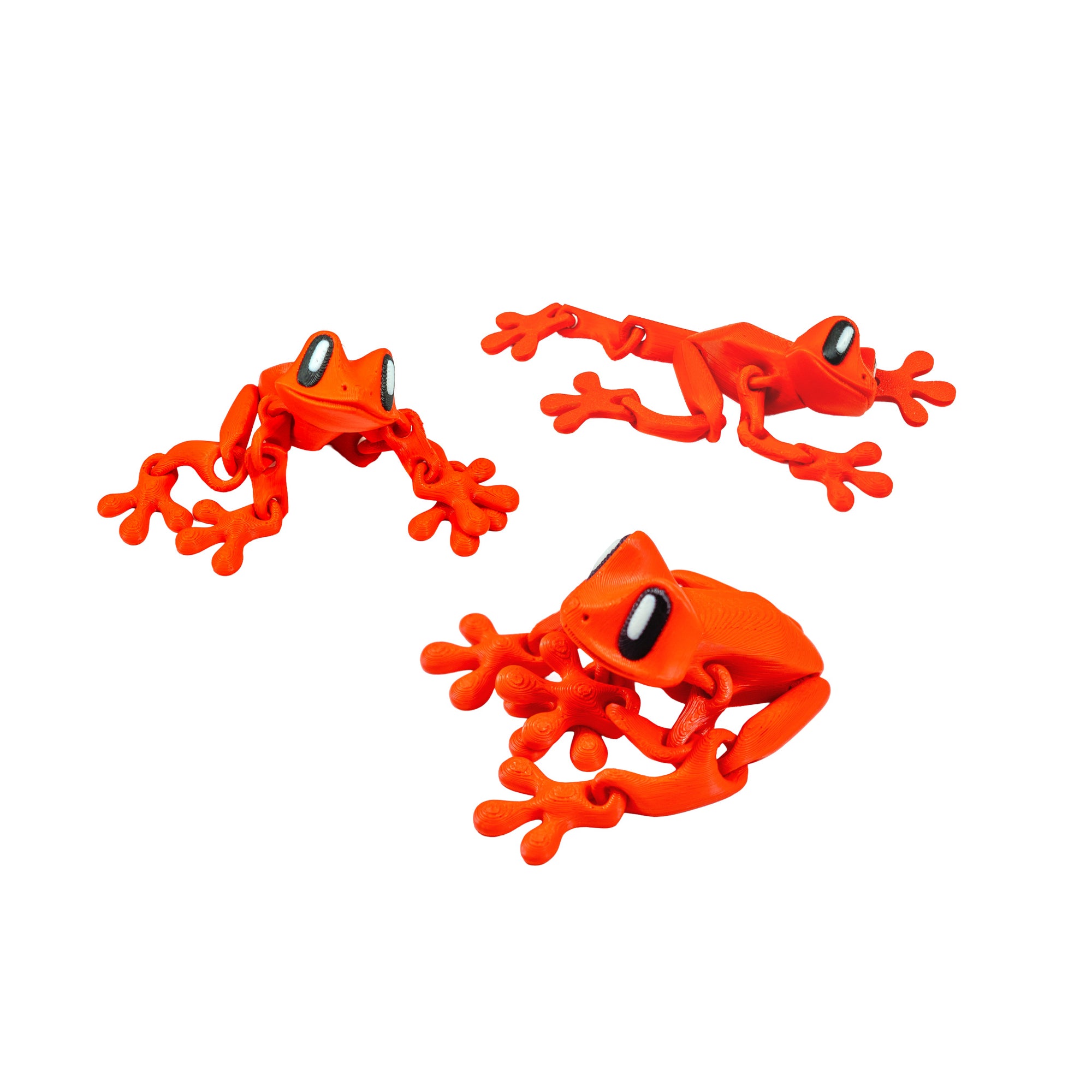 Three neon red 3D Printed Magnetic Frog Locker Buddies shown in different articulated poses.